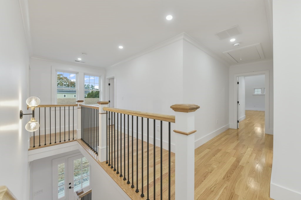 30 Oscars Way Dedham, MA 02026 - Photo 29 of 39 a view of a hallway