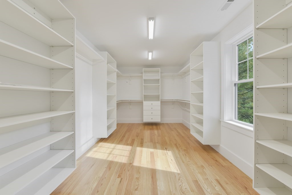 30 Oscars Way Dedham, MA 02026 - Photo 35 of 39 a view of a bedroom with wooden floor and windows
