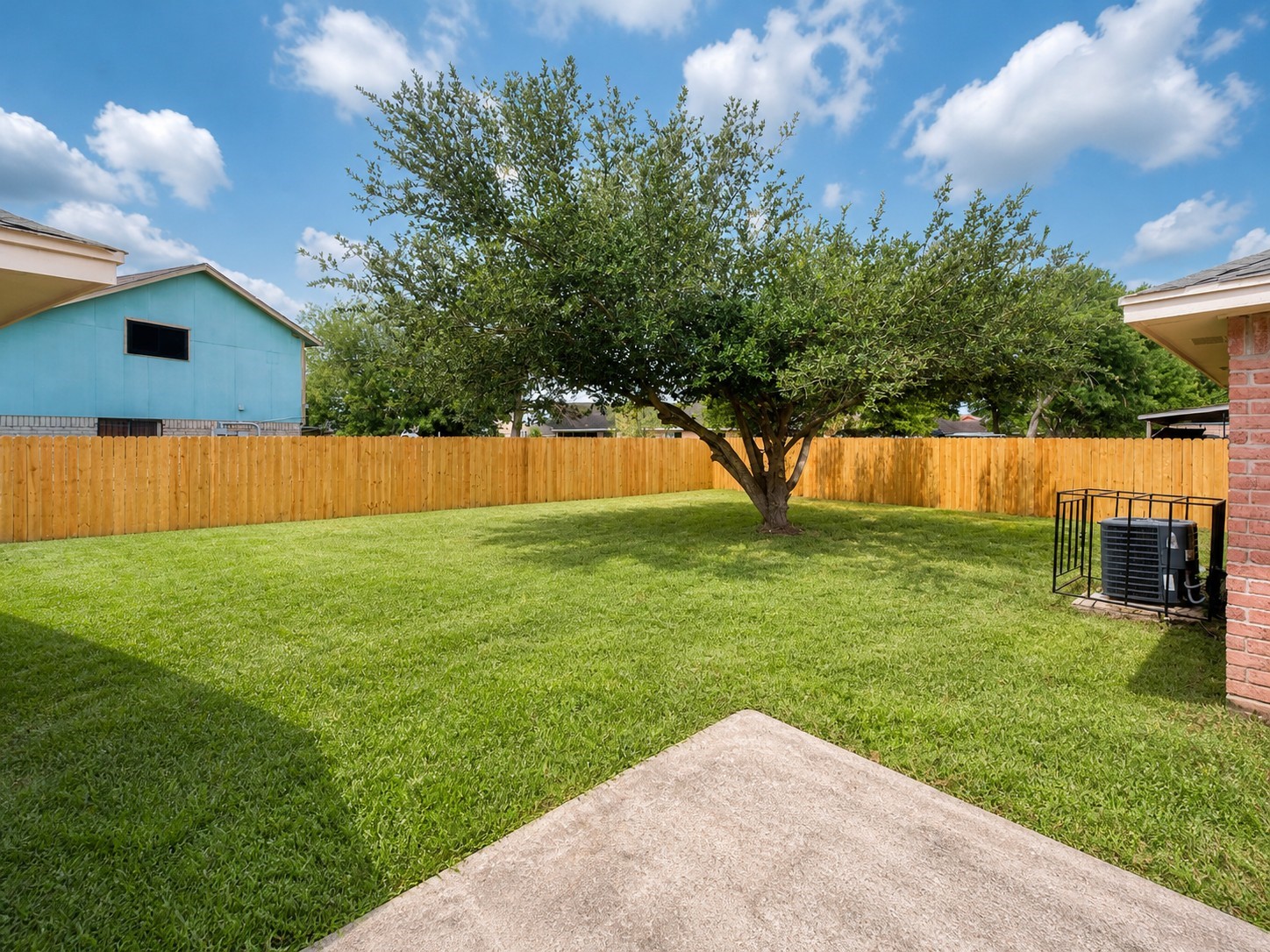 15950 Chimney Rock Road Missouri City, TX 77489 - Photo 8 of 9 a view of a backyard with a garden
