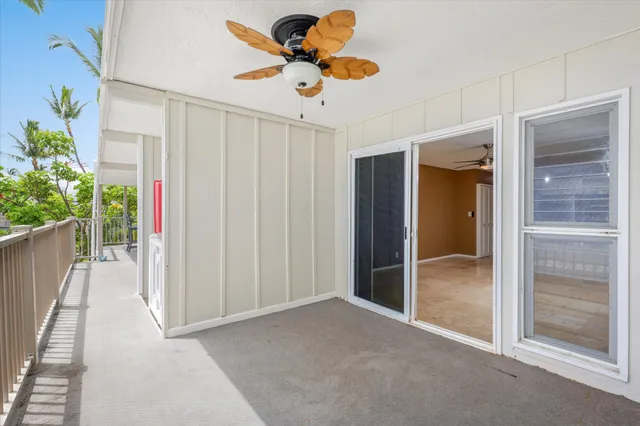 a view of livingroom with hardwood floor and a ceiling fan