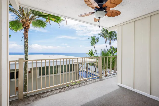 a view of a balcony with a potted plant