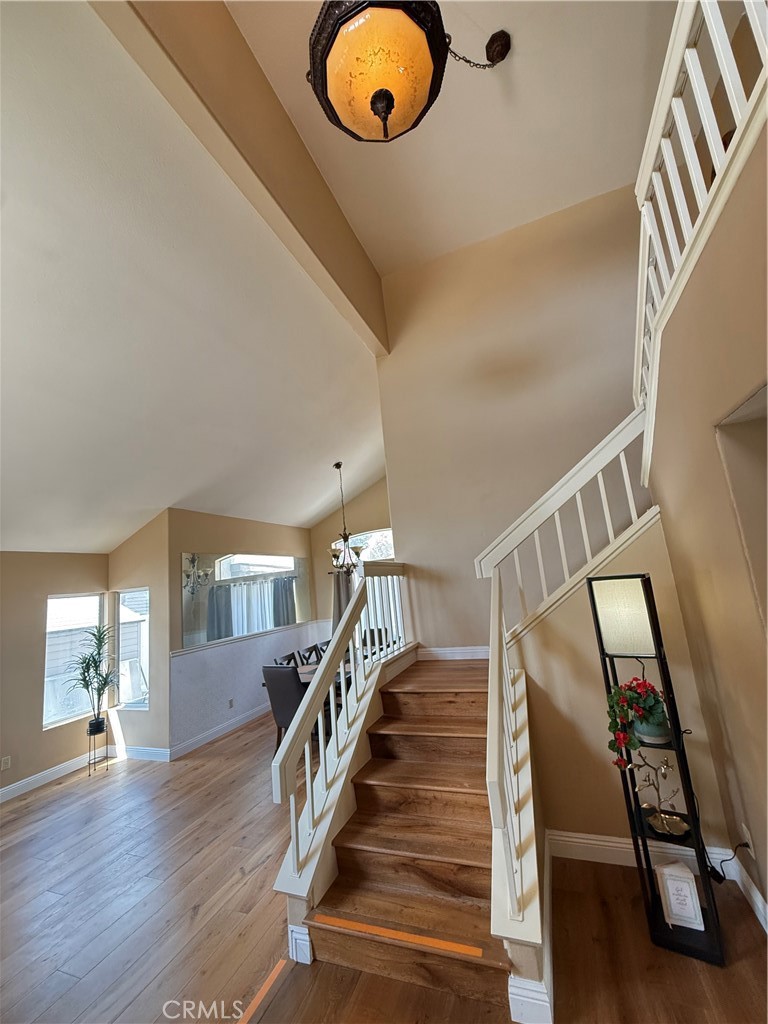 21182 Tennyson Road Moreno Valley, CA 92557 - Photo 6 of 36 a view of staircase with a washer and dryer