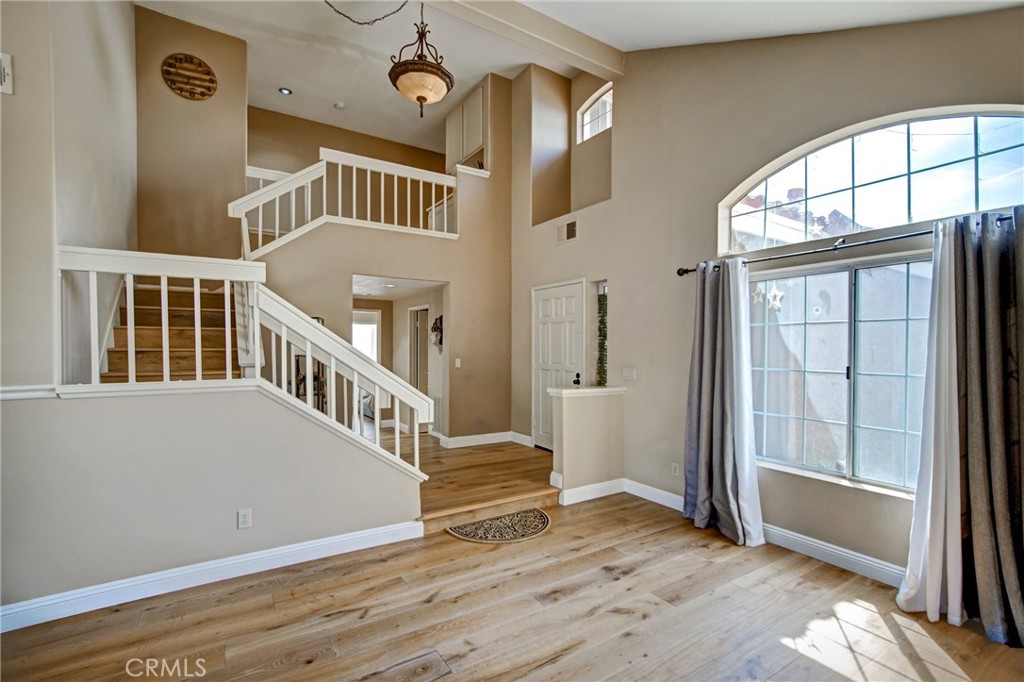 21182 Tennyson Road Moreno Valley, CA 92557 - Photo 8 of 36 an empty room with windows