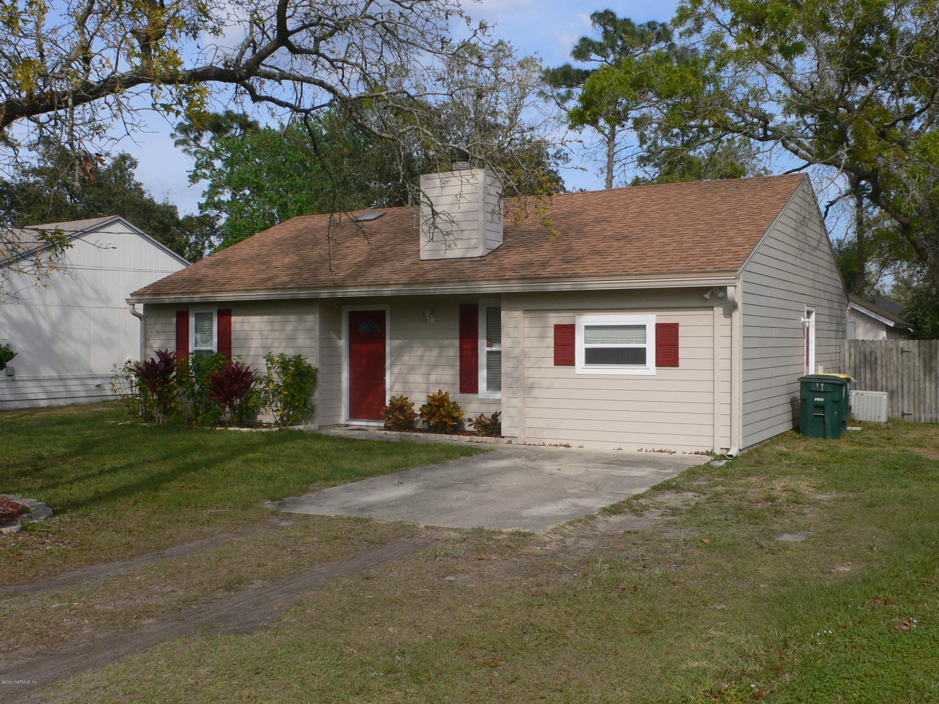 12779 Attrill Road Jacksonville, FL 32258 - Photo 1 of 11 a view of a house with a yard and tree s