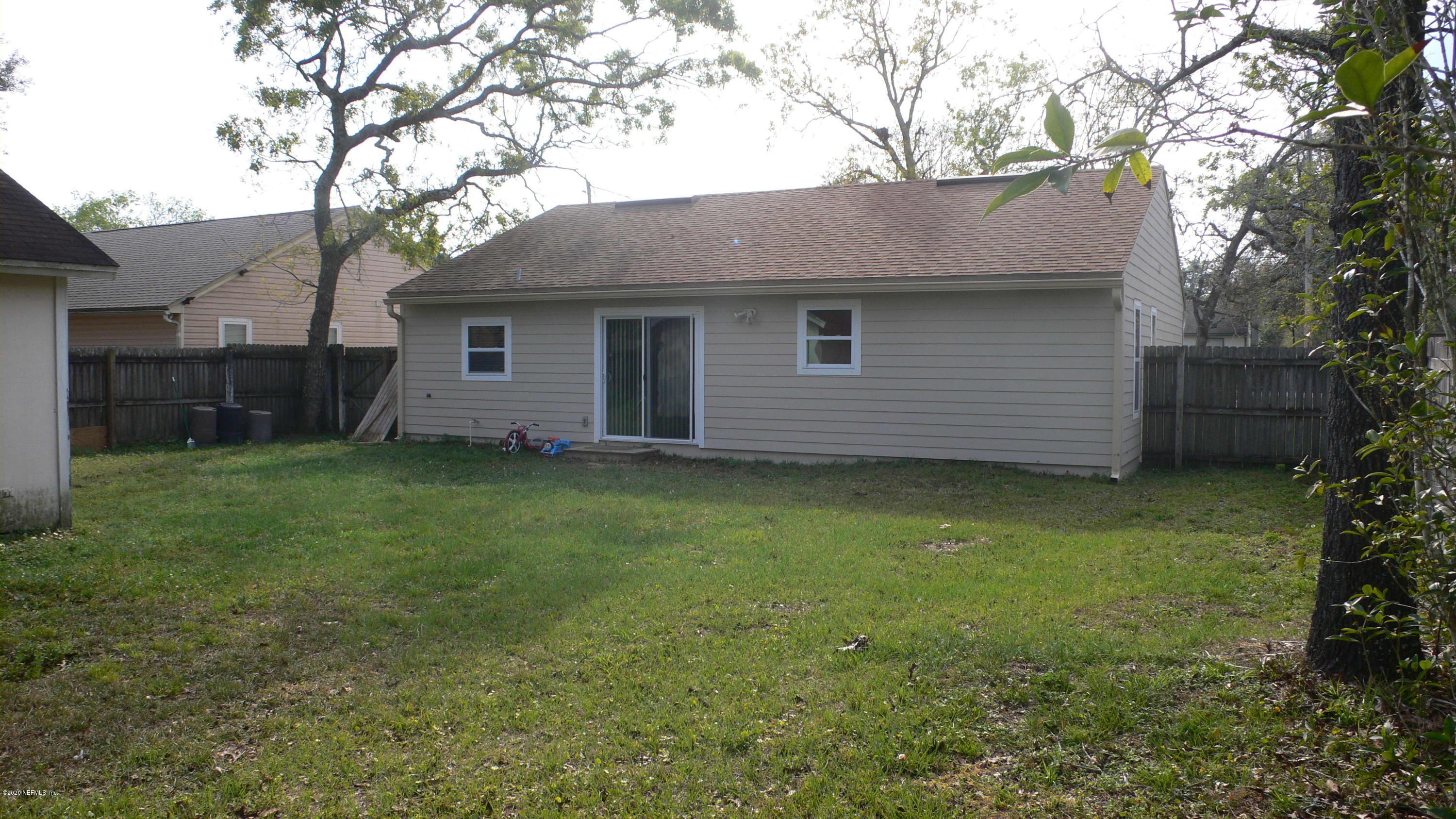 12779 Attrill Road Jacksonville, FL 32258 - Photo 11 of 11 a view of a house with a yard