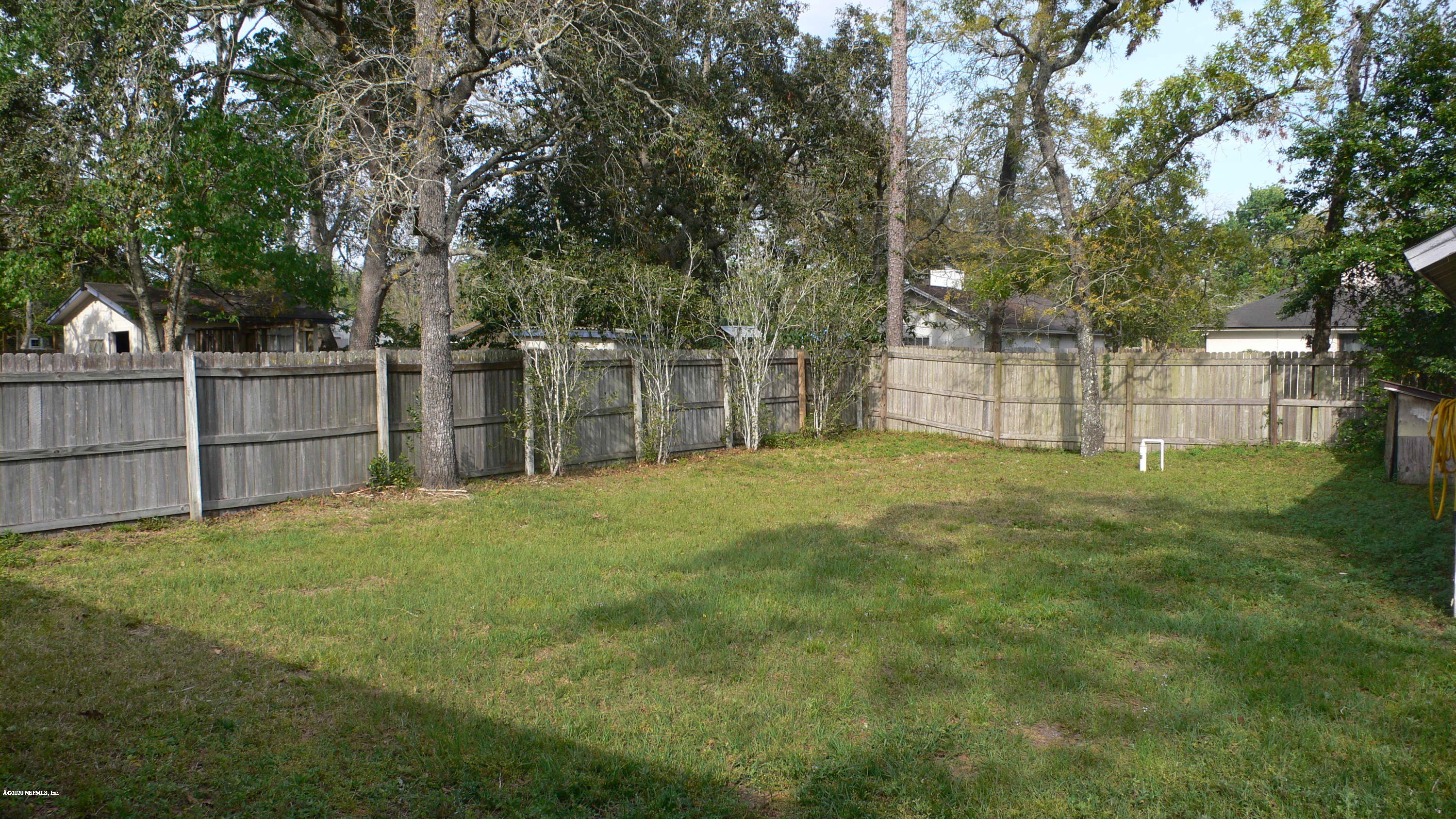 12779 Attrill Road Jacksonville, FL 32258 - Photo 10 of 11 a view of a yard with a large trees