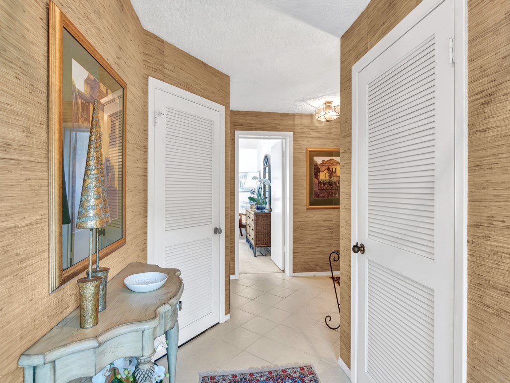 1155 Reef Road, Unit B2 Vero Beach, FL 32963 - Photo 14 of 32 a bathroom with a sink and a mirror