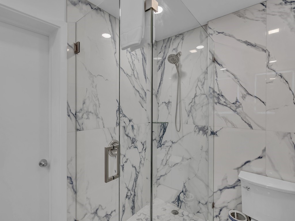 1155 Reef Road, Unit B2 Vero Beach, FL 32963 - Photo 18 of 32 a bathroom with a shower and toilet