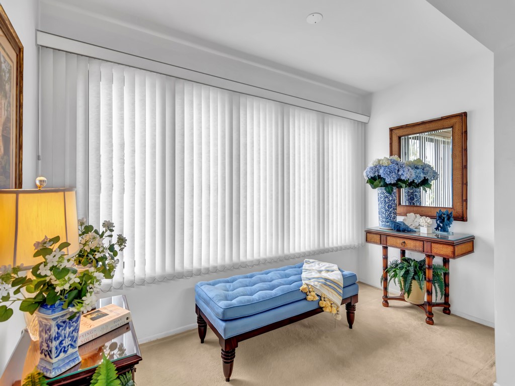 1155 Reef Road, Unit B2 Vero Beach, FL 32963 - Photo 19 of 32 a living room filled with furniture and a potted plant