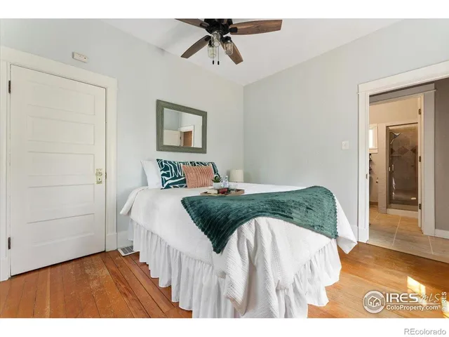 a bedroom with a bed and walk in closet