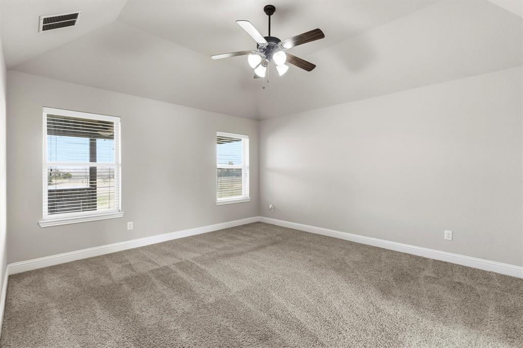 505 Water Fall Lane Nevada, TX 75173 - Photo 12 of 36 a view of an empty room with a window