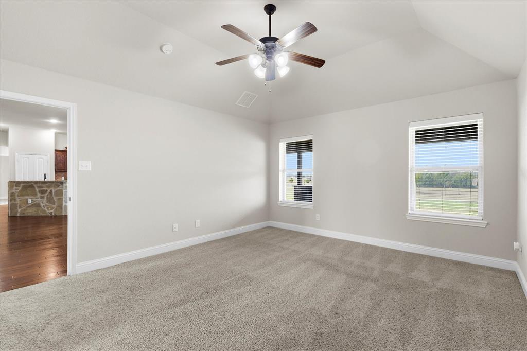 505 Water Fall Lane Nevada, TX 75173 - Photo 13 of 36 a view of an empty room with a window