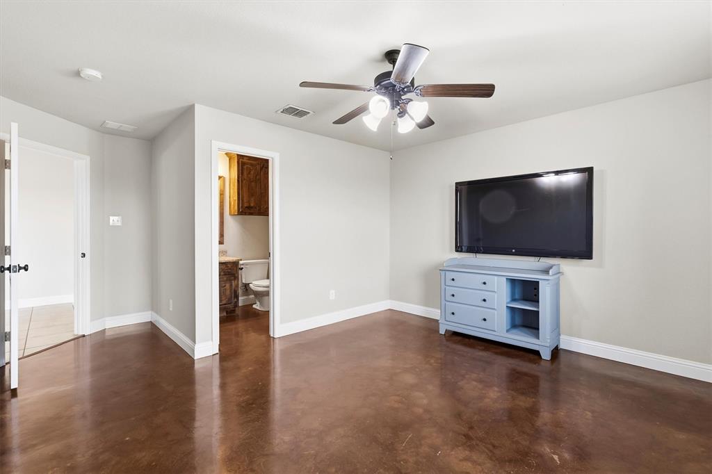 505 Water Fall Lane Nevada, TX 75173 - Photo 19 of 36 an empty room with furniture wooden floor and window