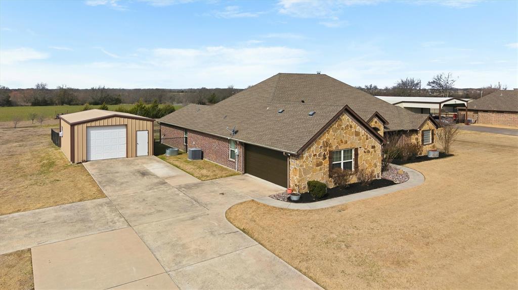 505 Water Fall Lane Nevada, TX 75173 - Photo 3 of 36 a view of a house with a terrace