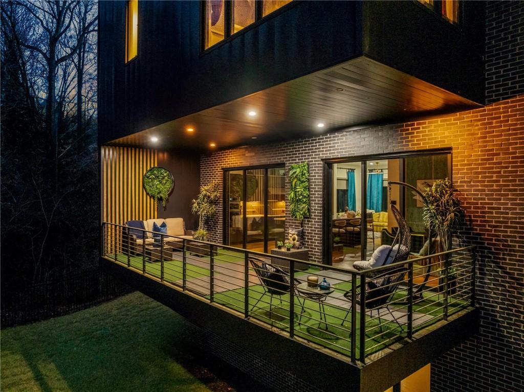 345 Pinecrest Road Northeast Atlanta, GA 30342 - Photo 29 of 70 a view of a living room with balcony and outdoor space