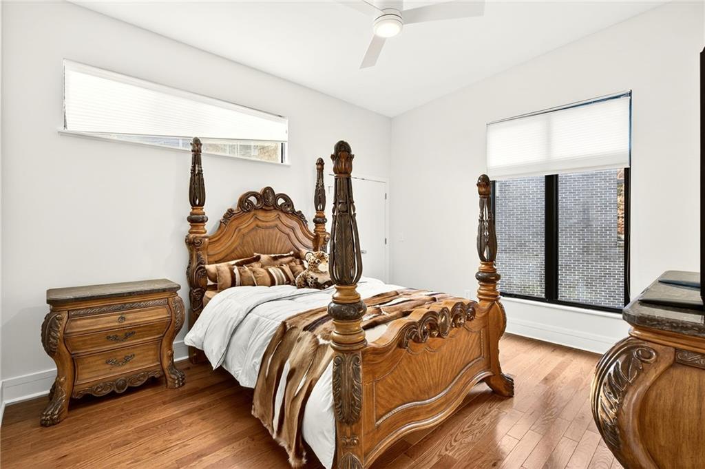 345 Pinecrest Road Northeast Atlanta, GA 30342 - Photo 43 of 70 a bedroom with a bed and a mirror