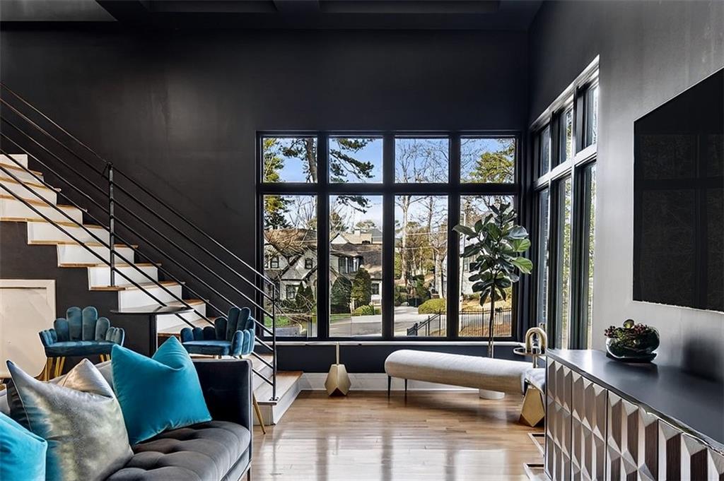 345 Pinecrest Road Northeast Atlanta, GA 30342 - Photo 53 of 70 a living room with furniture and floor to ceiling windows