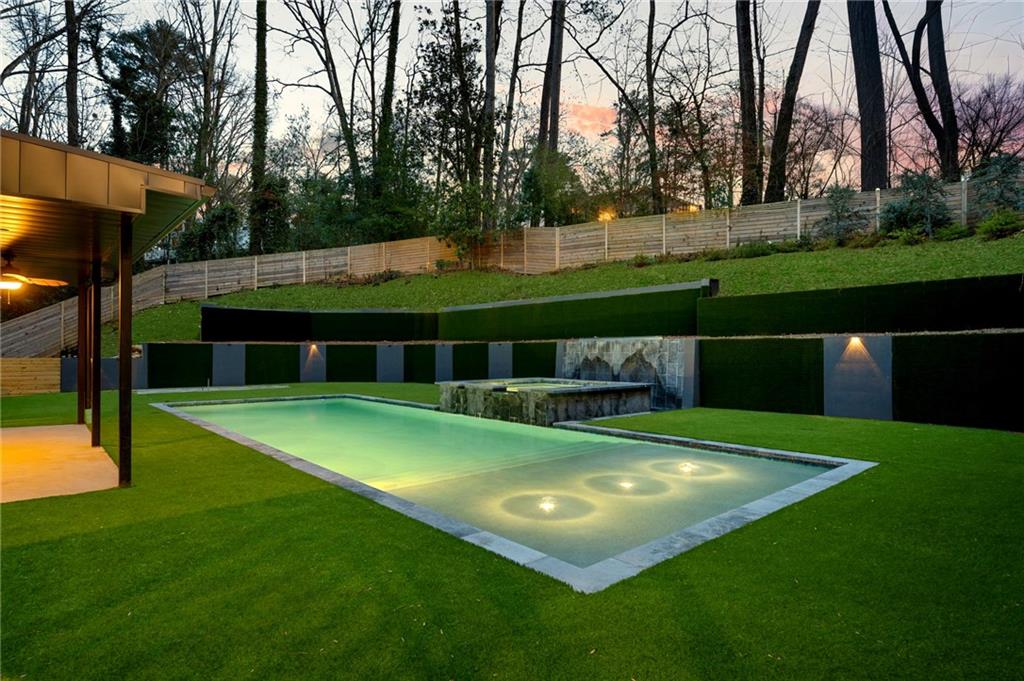 345 Pinecrest Road Northeast Atlanta, GA 30342 - Photo 67 of 70 a view of yard with swimming pool and green space
