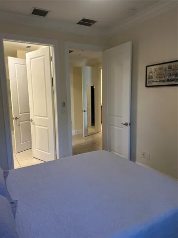 a bathroom with a shower a toilet and a sink