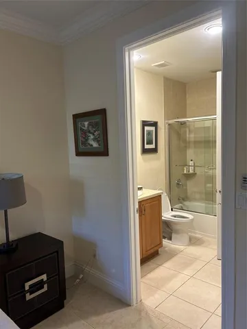 a bathroom with a bathtub sink and toilet