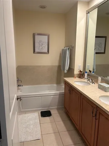 a bathroom with a sink a toilet and tub