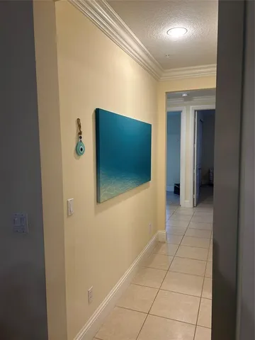 a kitchen with stainless steel appliances granite countertop a sink a stove counter space and cabinets