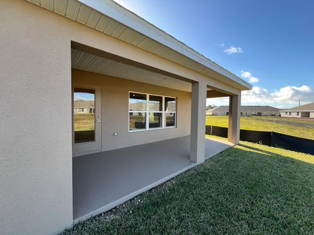 a view of a lake with a big yard