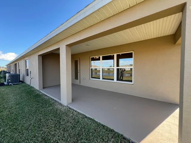 a view of a golf course with a lake