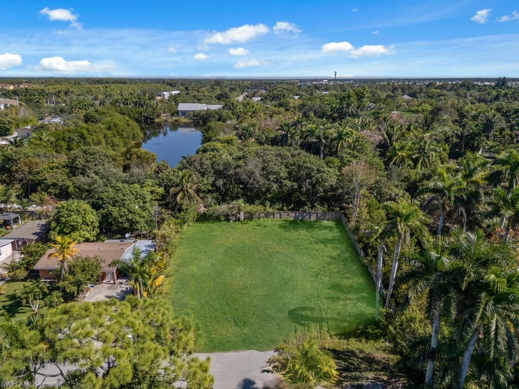 4975 Palmetto Court Naples, FL 34112 - Photo 5 of 18 a view of a garden from a yard