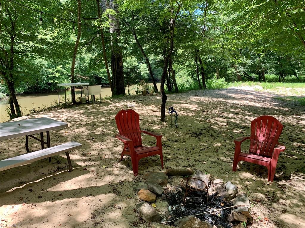 1665 Mission Road Danbury, NC 27016 - Photo 33 of 50 camp site beside river
