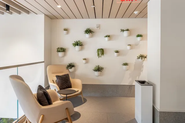 a bathroom with a toilet and shower