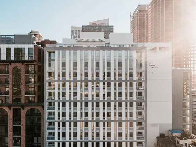 a view of a building with a street