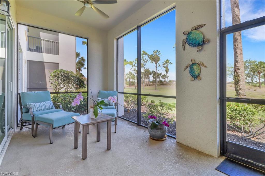 9208 Quartz Lane, Unit 102 Naples, FL 34120 - Photo 23 of 31 a view of a dining room with furniture and a potted plant