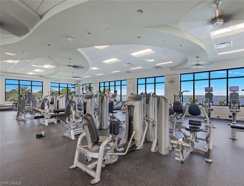 9208 Quartz Lane, Unit 102 Naples, FL 34120 - Photo 27 of 31 a view of a room with gym equipment