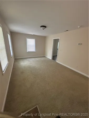 a view of a house with a swimming pool