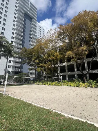 a view of a patio with a table and chairs