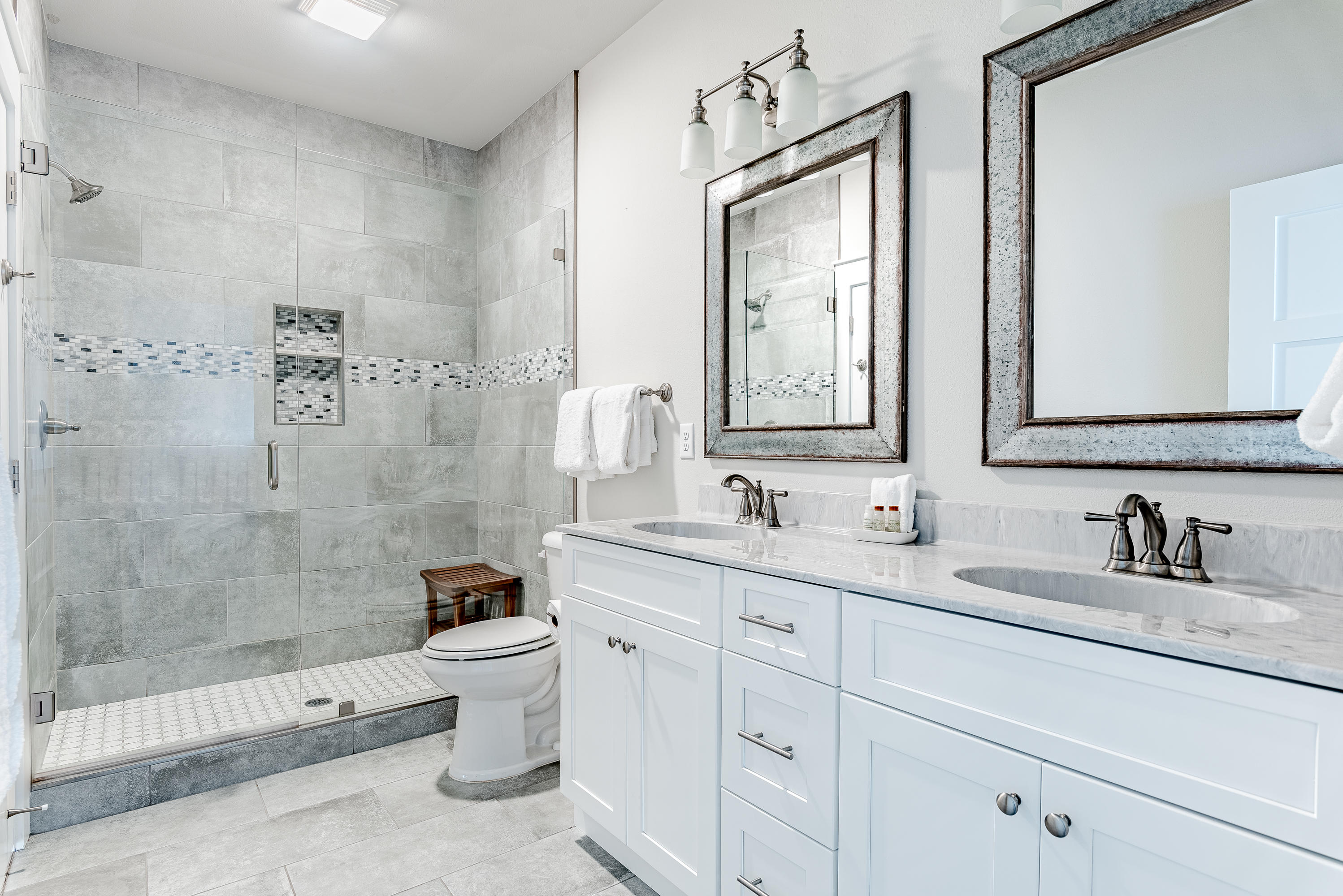 109 Santa Clara Street Santa Rosa Beach, FL 32459 - Photo 13 of 41 a bathroom with a double vanity sink toilet and shower