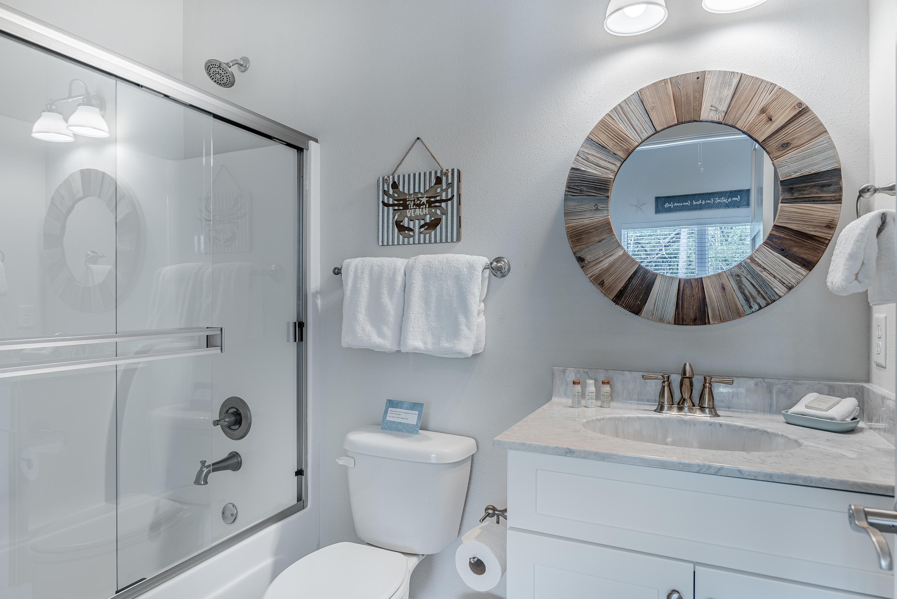 109 Santa Clara Street Santa Rosa Beach, FL 32459 - Photo 17 of 41 a bathroom with a sink and a mirror