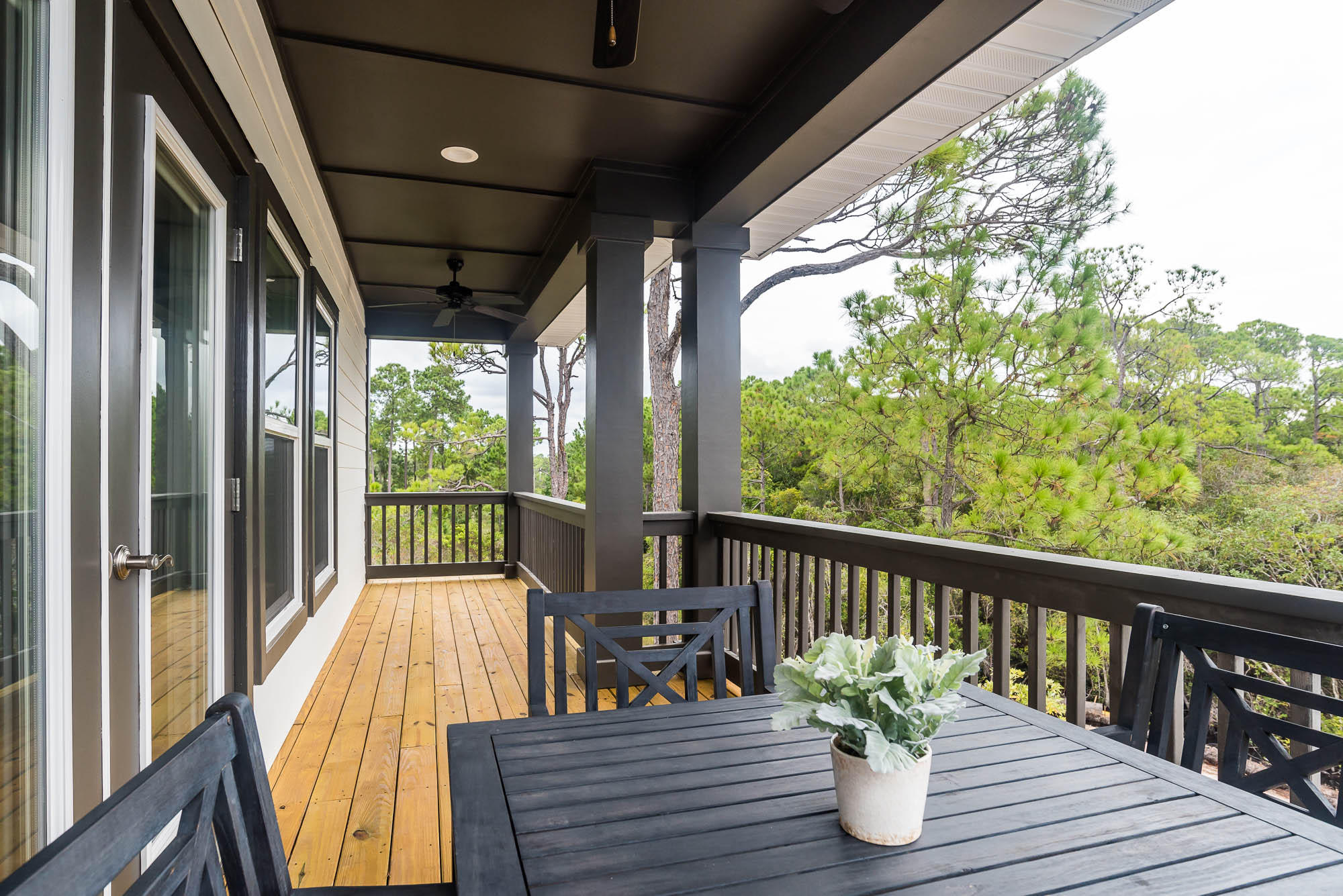 109 Santa Clara Street Santa Rosa Beach, FL 32459 - Photo 22 of 41 a view of a porch with wooden floor