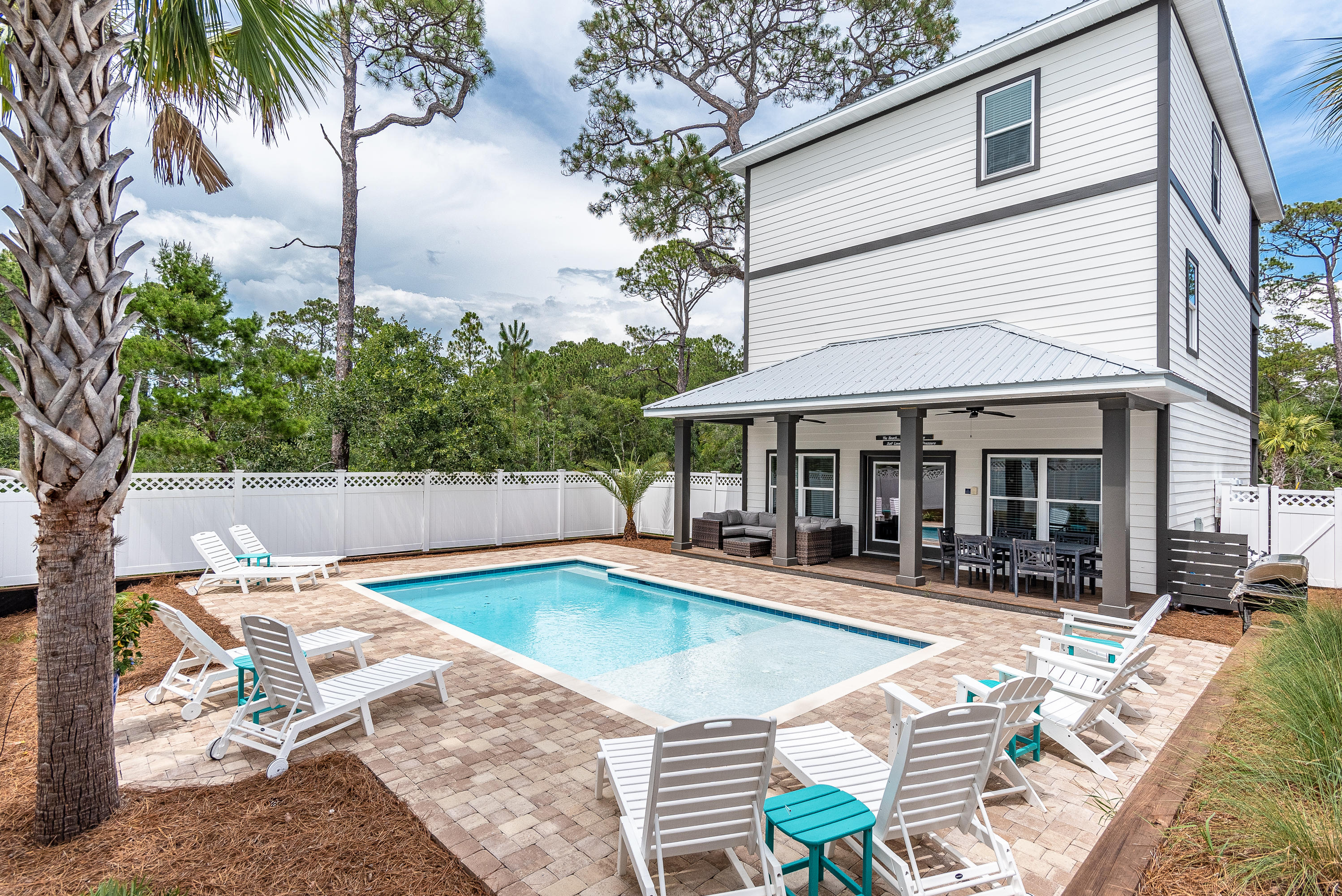 109 Santa Clara Street Santa Rosa Beach, FL 32459 - Photo 26 of 41 a view of a house with swimming pool and sitting area