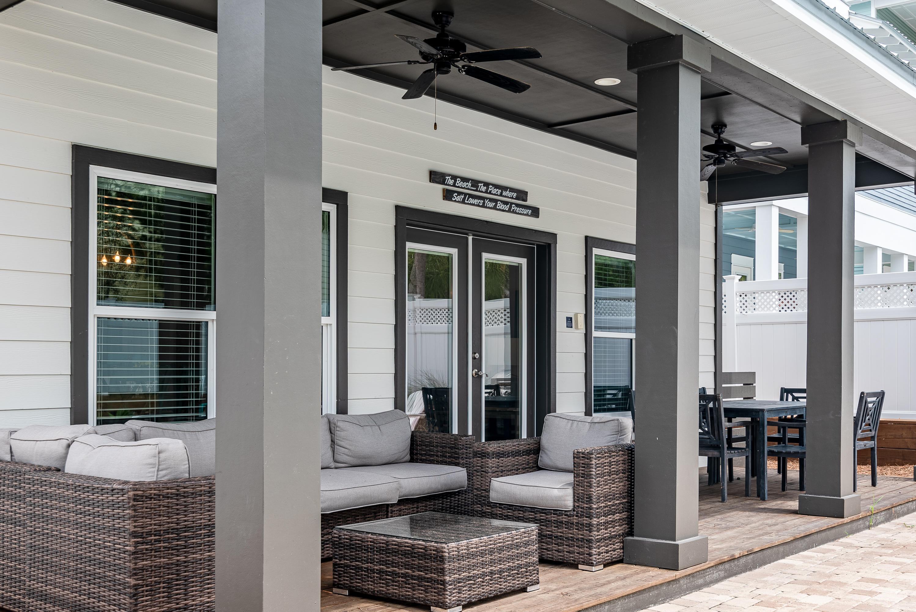 109 Santa Clara Street Santa Rosa Beach, FL 32459 - Photo 32 of 41 a outdoor living space with patio furniture and potted plants