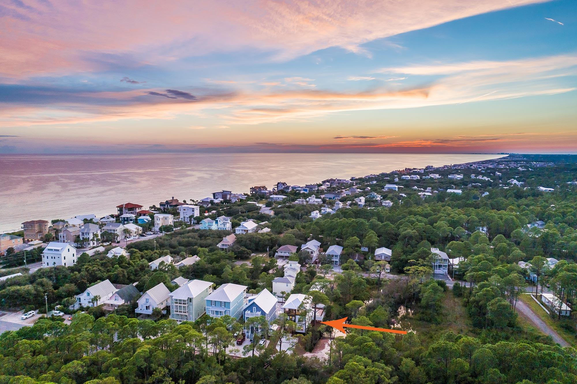 109 Santa Clara Street Santa Rosa Beach, FL 32459 - Photo 33 of 41 an aerial view of a city with lots of residential buildings and ocean view in back