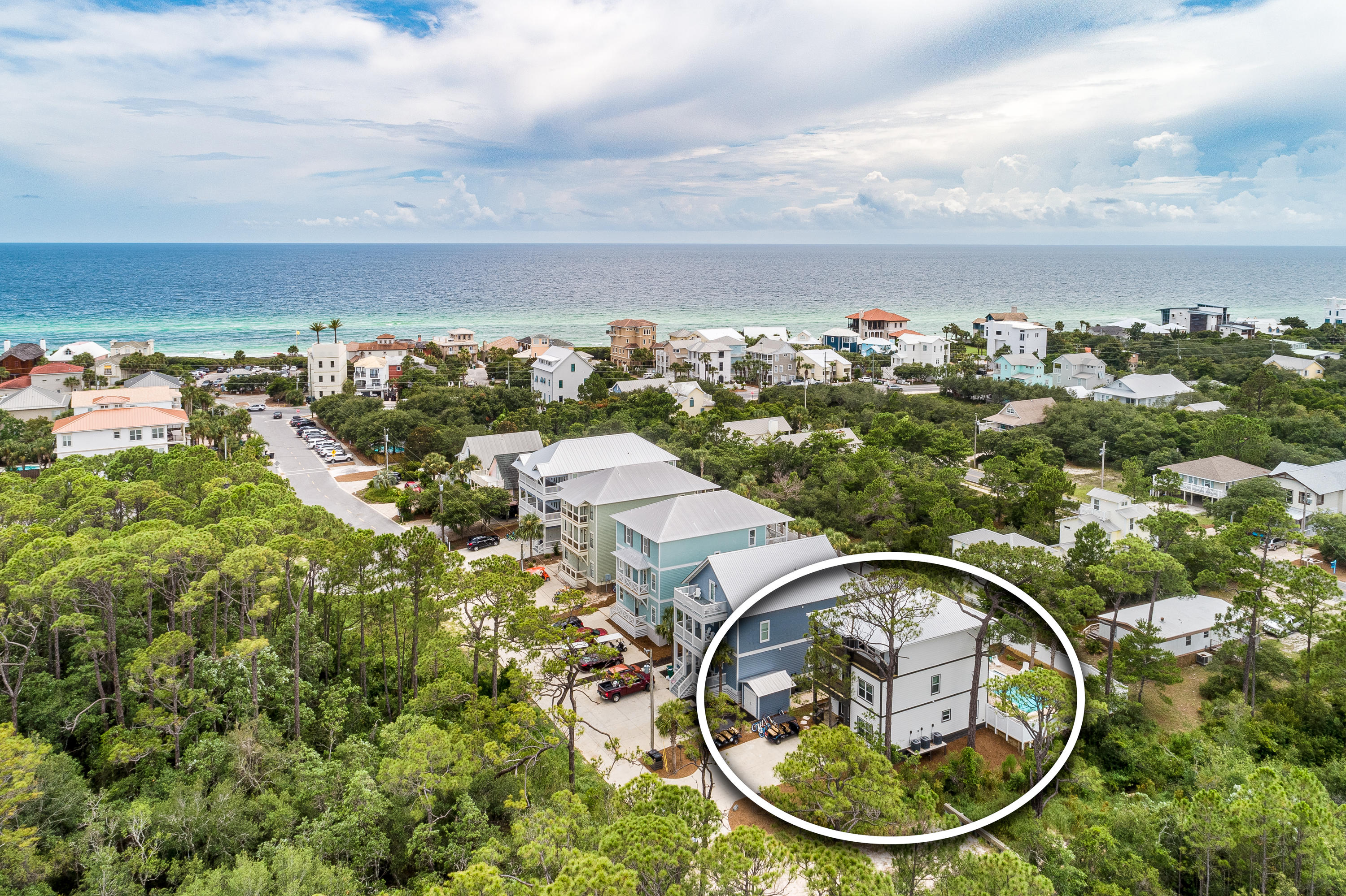 109 Santa Clara Street Santa Rosa Beach, FL 32459 - Photo 35 of 41 an aerial view of a house with a garden and lake view