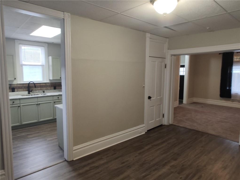 533 3rd Street Pitcairn, PA 15140 - Photo 12 of 37 a view of a kitchen with a sink cabinets and wooden floor