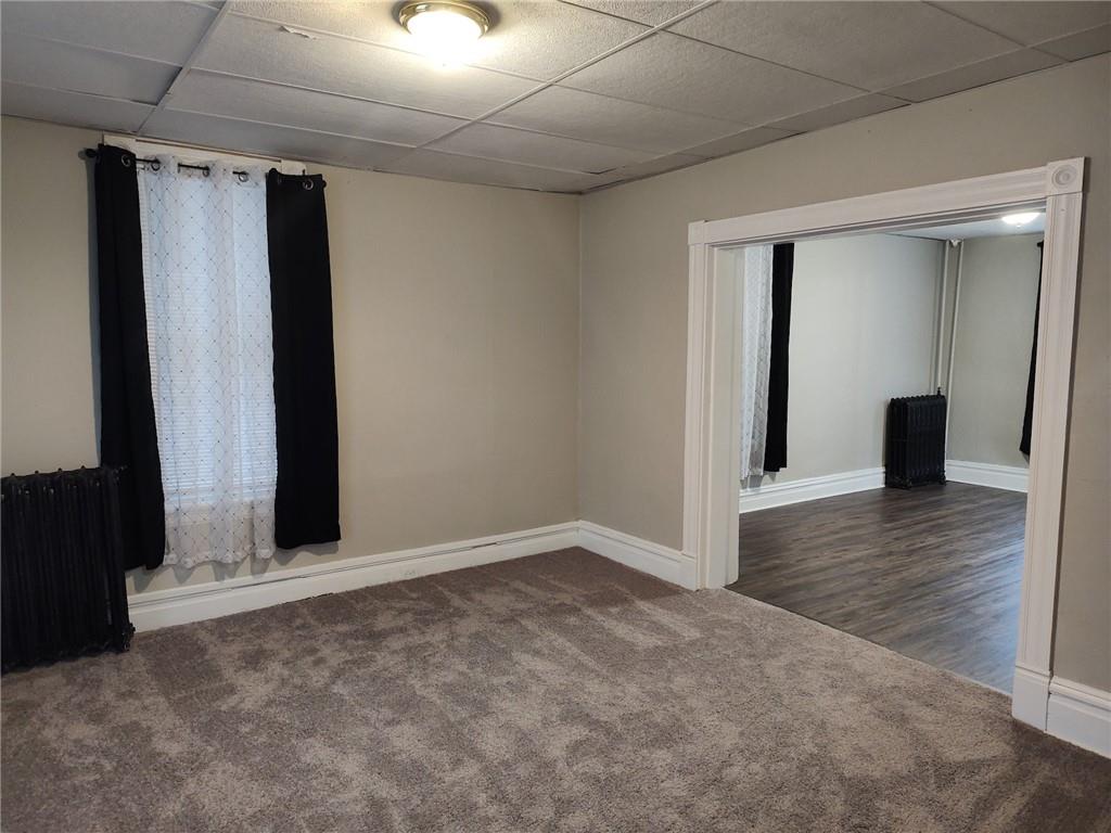 533 3rd Street Pitcairn, PA 15140 - Photo 16 of 37 an empty room with wooden floor and closet