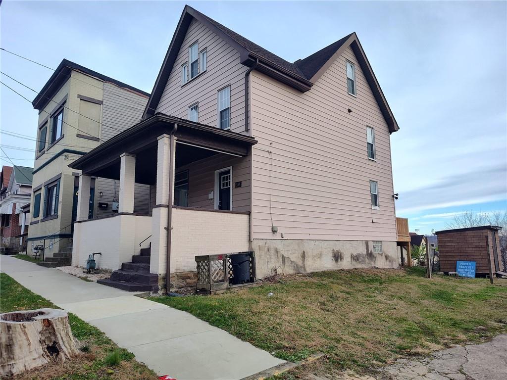 533 3rd Street Pitcairn, PA 15140 - Photo 2 of 37 a view of a house with a yard