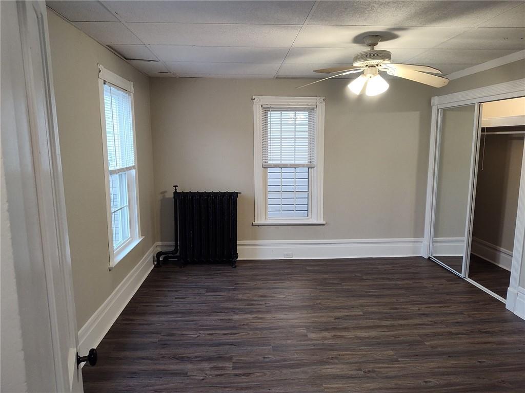 533 3rd Street Pitcairn, PA 15140 - Photo 24 of 37 a view of an empty room with wooden floor and a window