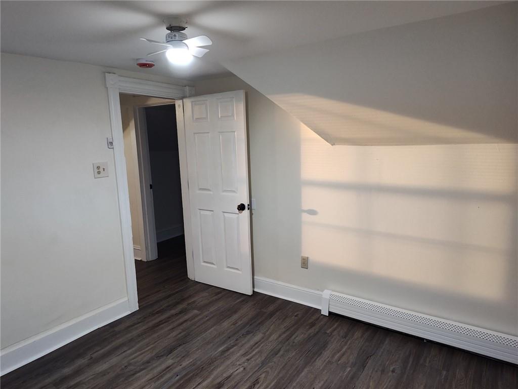 533 3rd Street Pitcairn, PA 15140 - Photo 30 of 37 an empty room with wooden floor and windows