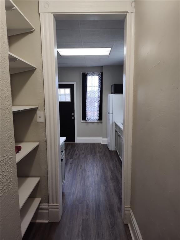 533 3rd Street Pitcairn, PA 15140 - Photo 6 of 37 a view of a hallway view with wooden floor and staircase