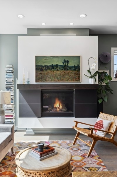2046 West Rice Street, Unit 2 Chicago, IL 60622 - Photo 5 of 14 a living room with furniture and a fireplace